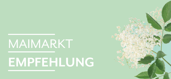 KI generiert: Das Bild zeigt reife Orangen, die an einem Baum hängen. Auf der linken Seite steht der Text "Orangen Kampagne".